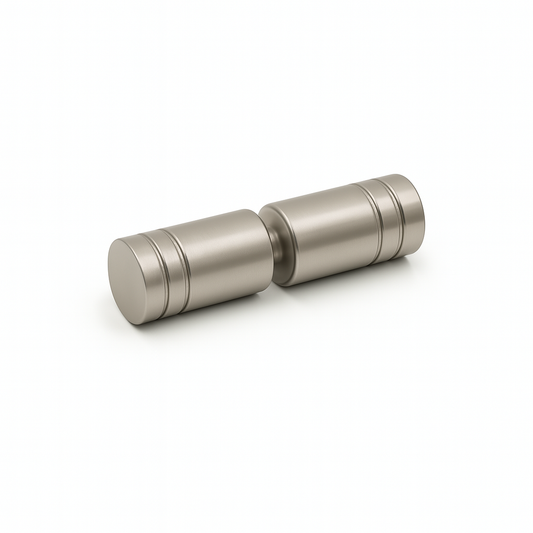 Pair of metallic salt and pepper shakers on a white background